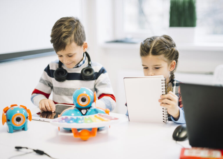 Children exploring hands-on learning and creative play with limited digital use at Starfish Early Learning Centre