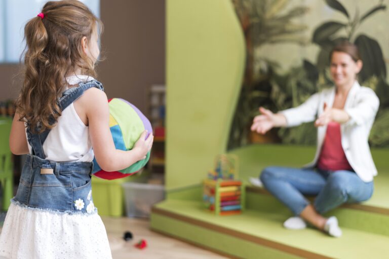 Children learning emotional well-being through play, storytelling, and supportive care at Starfish Early Learning Centre